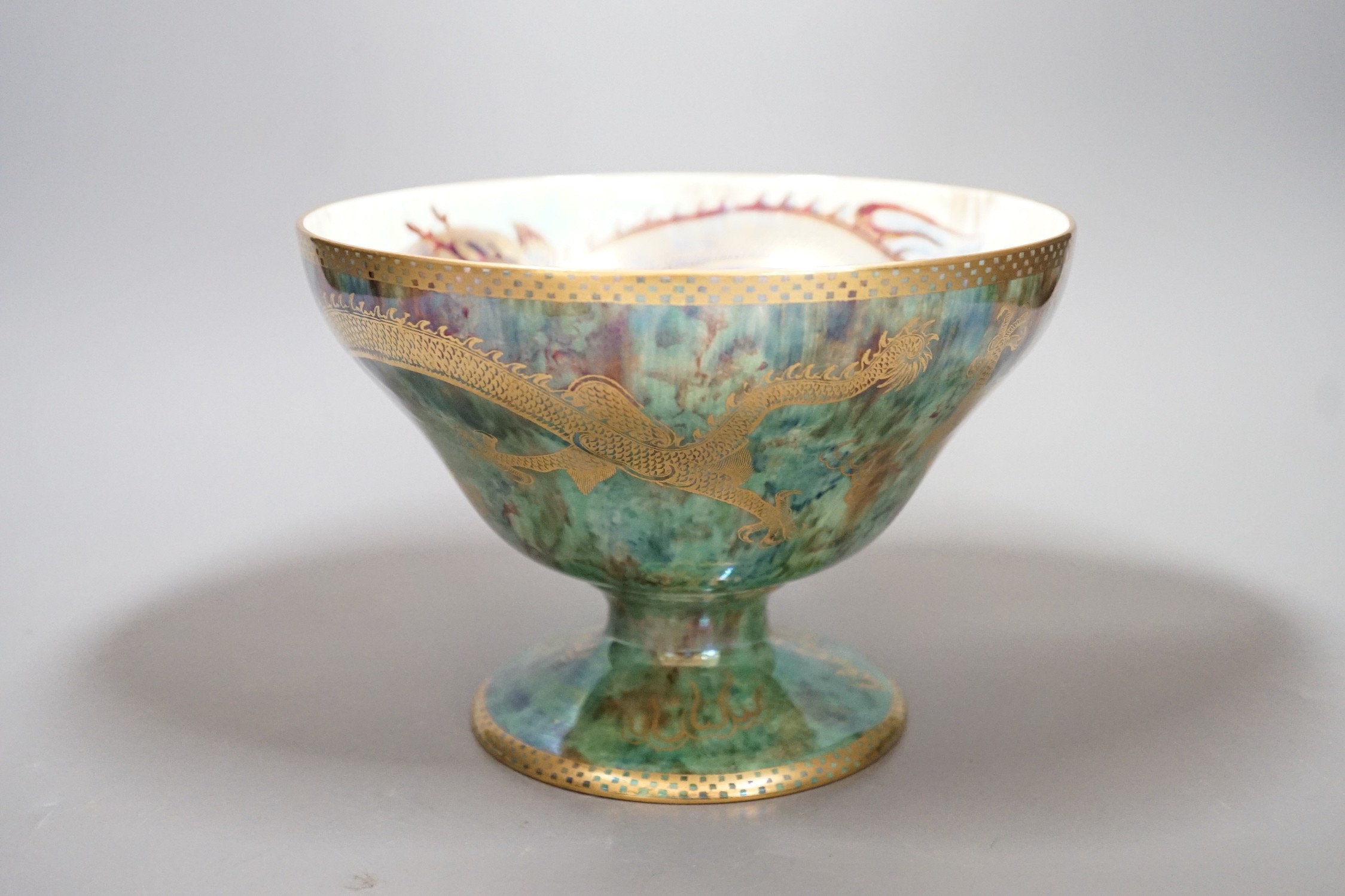 A Wedgwood dragon lustre pedestal bowl, designed by Daisy Makeig-Jones, pattern z4831, 14cms high